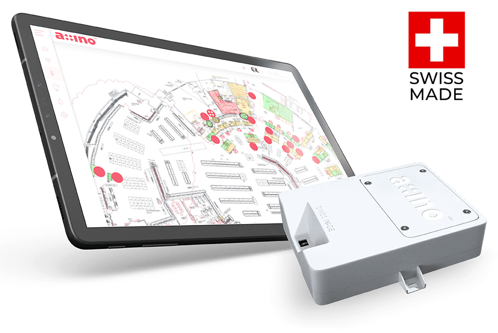 An Axino sensor in front of the Axino app running on a tablet